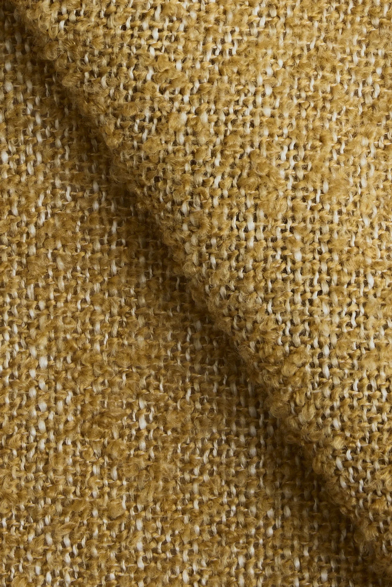 Sengeteppe Bouclé fra Gotain i fargen sennepsgult / Mustard