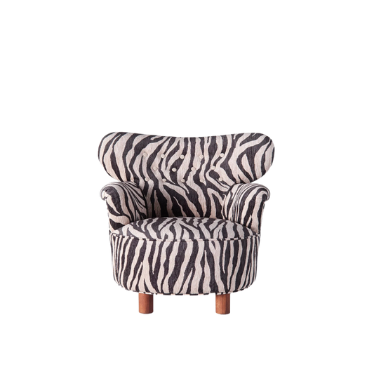 Den omfavnende lenestolen Elias Armchair fra Dusty Deco ble opprinnelig designet av Elias Svedberg på slutten av 1930-tallet.