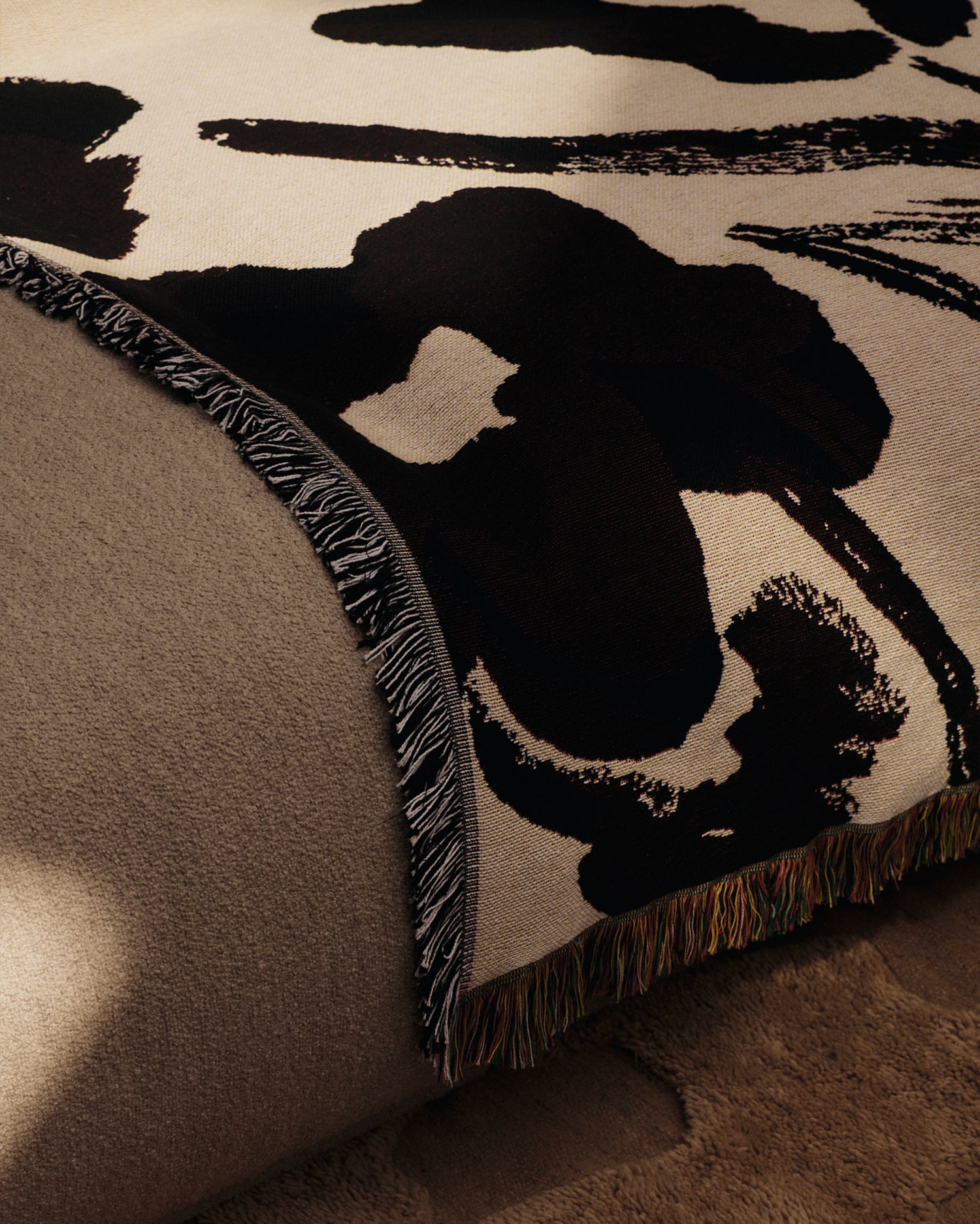 Pledd Cilla Tapestry Blanket fra Ferm Living.