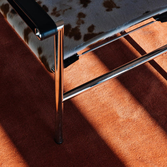 Ullteppet Classic Solid fra Layered i fargen Red Ochre