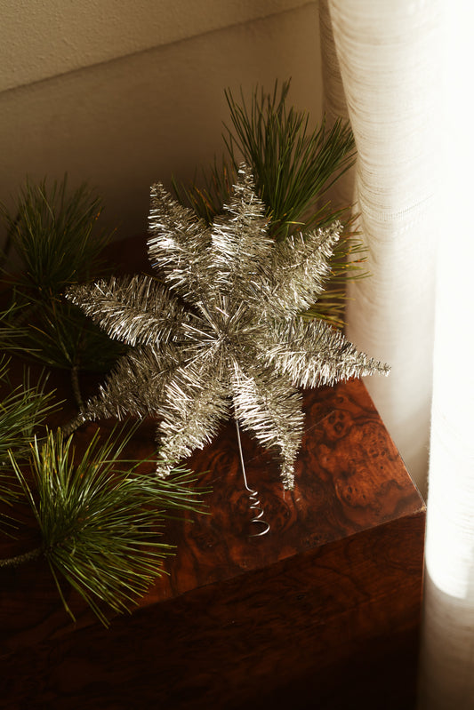 Toppstjerne med tinsel