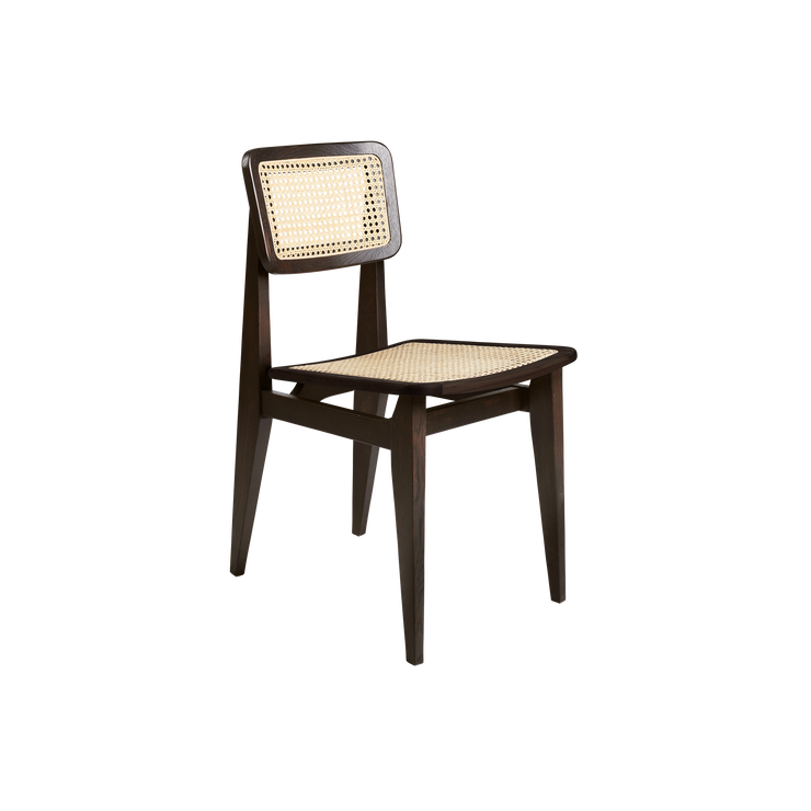 Stolen ble designet i 1947 av den franske designeren Marcel Gascoin, og er regnet som en enkel og funksjonell klassiker med et tydelig formspråk. Denne er i svartlakkert eik.