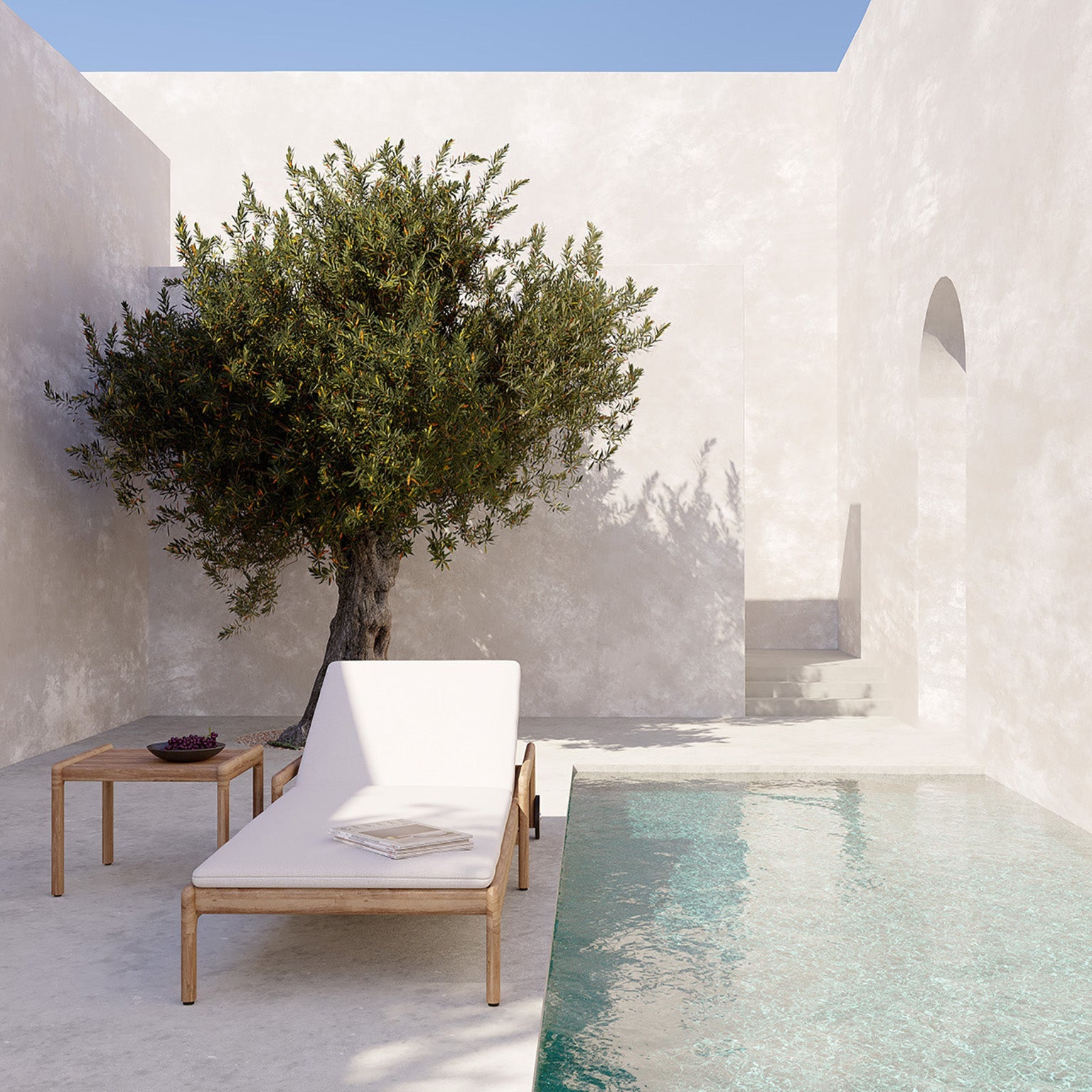 Sidebord Jack Outdoor Side Table og solseng Jack Outdoor Adjustable Lounger fra Ethnicraft. 

