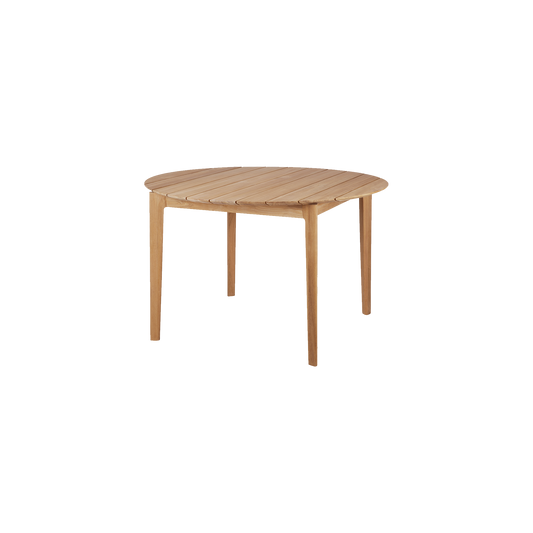 Det runde spisebordet Bok Outdoor Dining Table fra Ethnicraft er nydelig utført i teak, en hardfør tresort som patinerer vakkert over tid. 