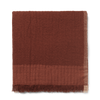 Pleddet Weaver Throw fra Ferm Living i fargen Red Brown. 