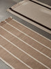Ferm Living sine Løper Calm Kelim i fargene Off-white/Dark Sans og Off-white/Coffee
