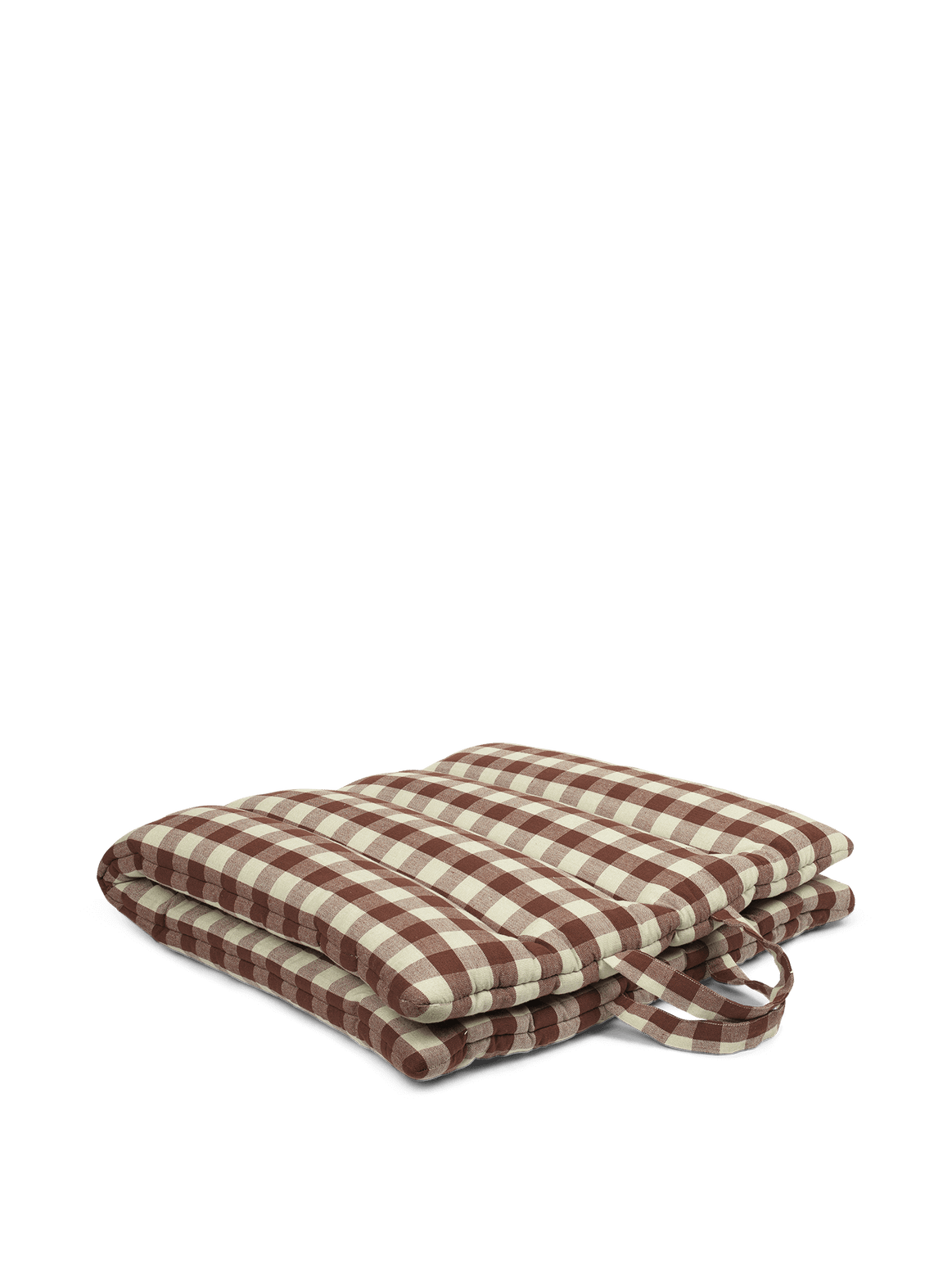 Sammenleggbar matte Bothy Check fra Ferm Living. Den kan brukes på gulvet eller på en stol for ekstra komfort.