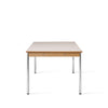 Bord Co Table Creme 100x240 cm fra Audo Copenhagen med kremfarget bordplate i laminat med ben i krom og detaljer i lys eik.
