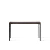 Bord Co Table Terra 70x140 cm fra Audo Copenhagen med kullfarget bordplate i laminat med sorte ben og detaljer i mørk eik.