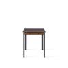 Bord Co Table Terra 70x140 cm fra Audo Copenhagen med kullfarget bordplate i laminat med sorte ben og detaljer i mørk eik.