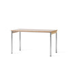 Bord Co Table Creme 70x140 cm fra Audo Copenhagen med kremfarget bordplate i laminat med ben i krom og detaljer i lys eik.
