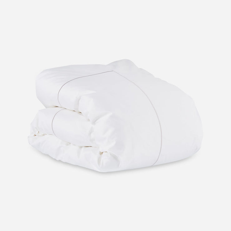 Dynetrekket Nuvola fra Mille Notti med sandfarget brodering