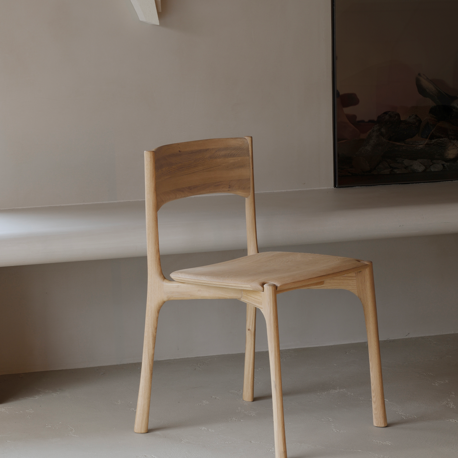 Stol Pl Dining Chair fra Ethnicraft i oljet eik uten armlene fra Ethnicraft.