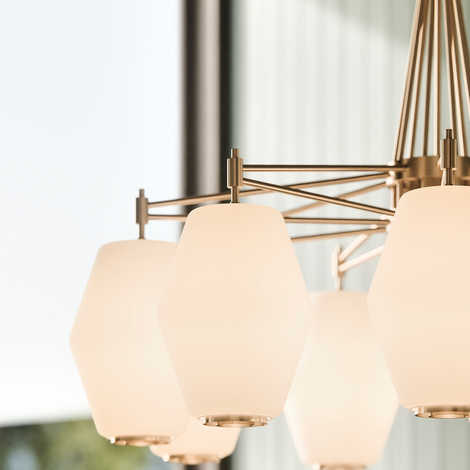 Taklampe Dahl Chandelier i messingfinish med små glasskupler fra Northern.