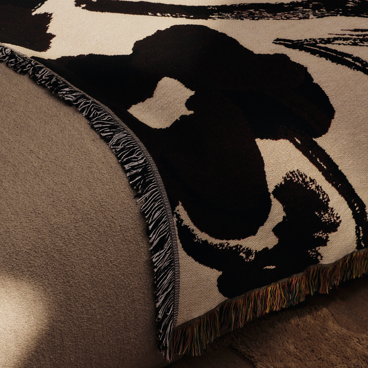 Pledd Cilla Tapestry Blanket fra Ferm Living.