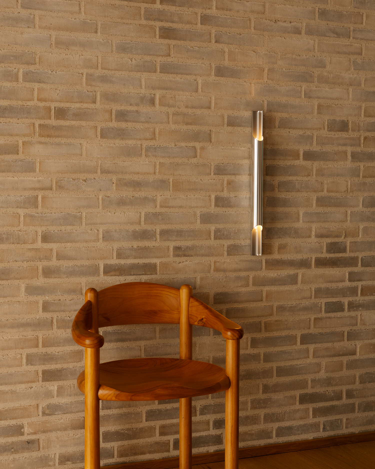 Vegglampe Pan 50 i aluminium fra Lyfa.