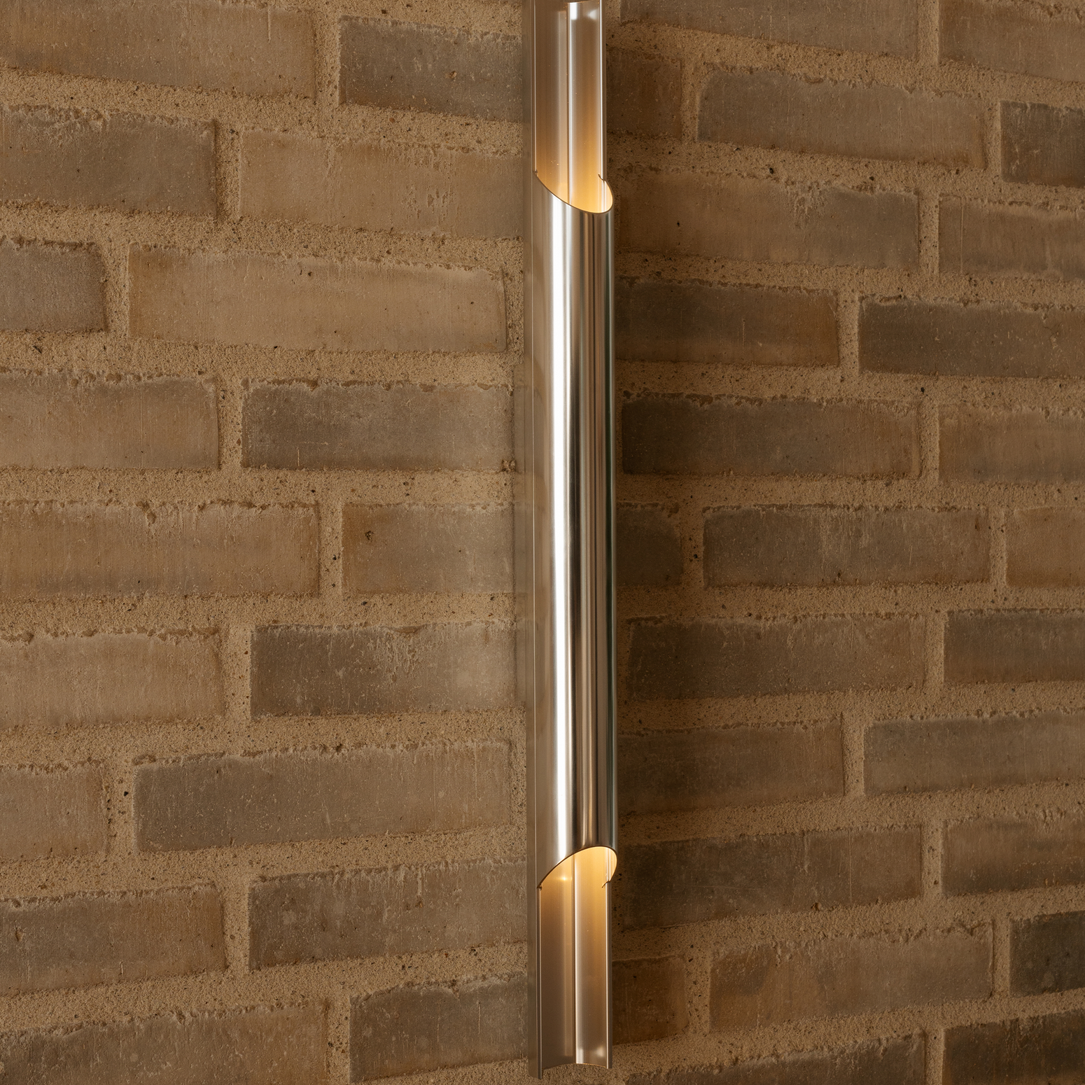 Vegglampe Pan 50 i aluminium fra Lyfa.