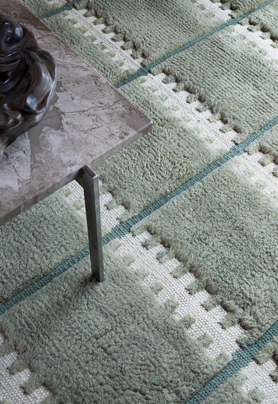 Ullteppe Lilly fra Layered i fargen Green