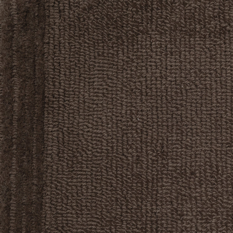 Teppe Ground fra Massimo Copenhagen i fargen Walnut.