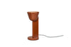 Bordlampen Céramique Up i fargen Rust Red. Denne kan plasseres der du har behov for mer indirekte omgivelsesbelysning.