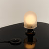 Oppladbar bordlampe Seine Portable Lamp fra Gubi.