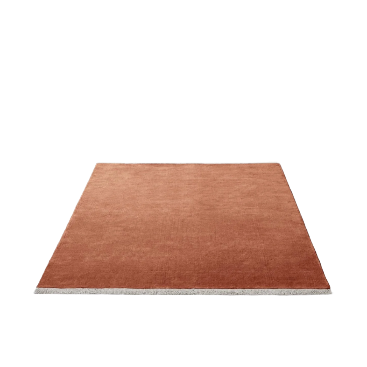 The Moor Rug fra &tradition i fargen Red Heather med frynser