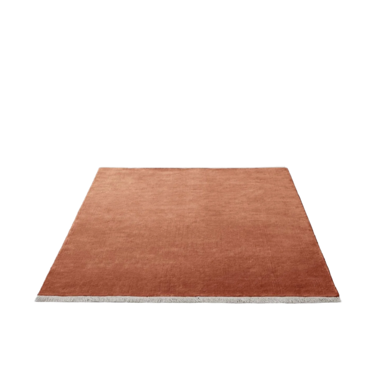 The Moor Rug fra &tradition i fargen Red Heather med frynser