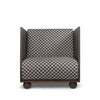 Lenestolen Rum Lounge Chair fra Ferm Living i det rutete, ullbaserte tekstilet "Check". 