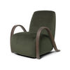 Lenestolen Buur Lounge Chair fra Ferm Living i den dypgrønne veluren Rich Velvet i fargen Pine. (Tekstil prisgruppe 2)
