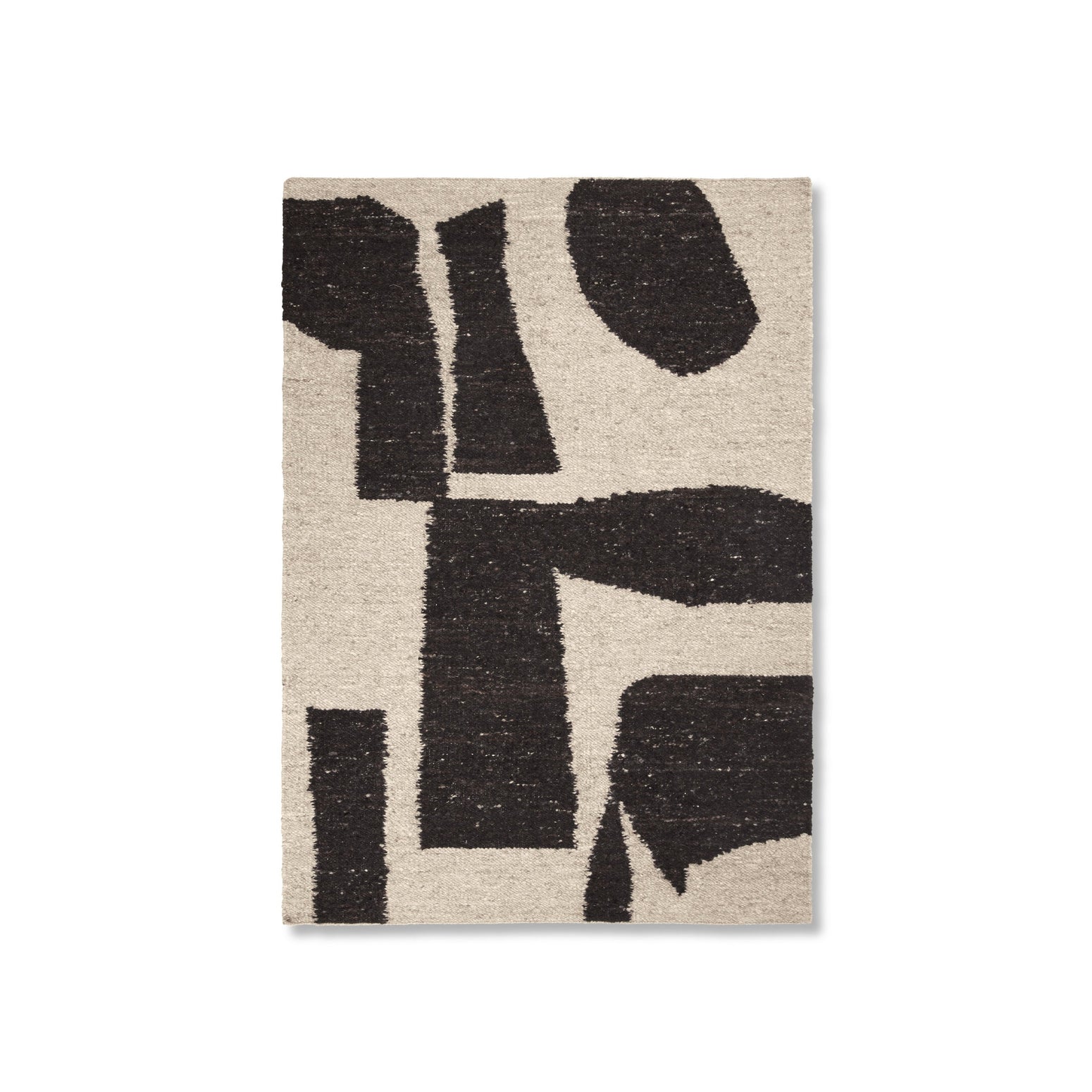 Teppet Piece Rug fra Ferm Living i størrelsen 140x200 cm i fargen Off-White/Coffee.