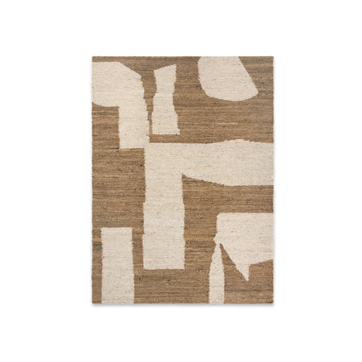 Teppet Piece Rug fra Ferm Living i størrelsen 140x200 cm i fargen Off-White/Toffee.