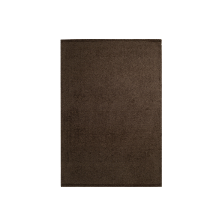 Teppe Ground fra Massimo Copenhagen i fargen Walnut.