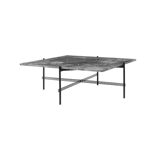 TS Table Square fra Gubi, skaper en sofistikert og skulpturell estetikk for ethvert rom med sine karakteristiske slanke ben og solid bordplate.