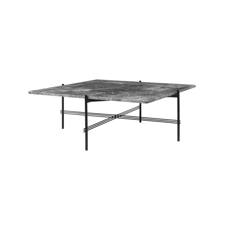 TS Table Square fra Gubi, skaper en sofistikert og skulpturell estetikk for ethvert rom med sine karakteristiske slanke ben og solid bordplate.