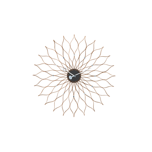 Klokken Sunflower Clock, fra Vitra blir som et nydelig smykke på veggen din, og er et perfekt og tidsriktig alternativ til kunst og bilder