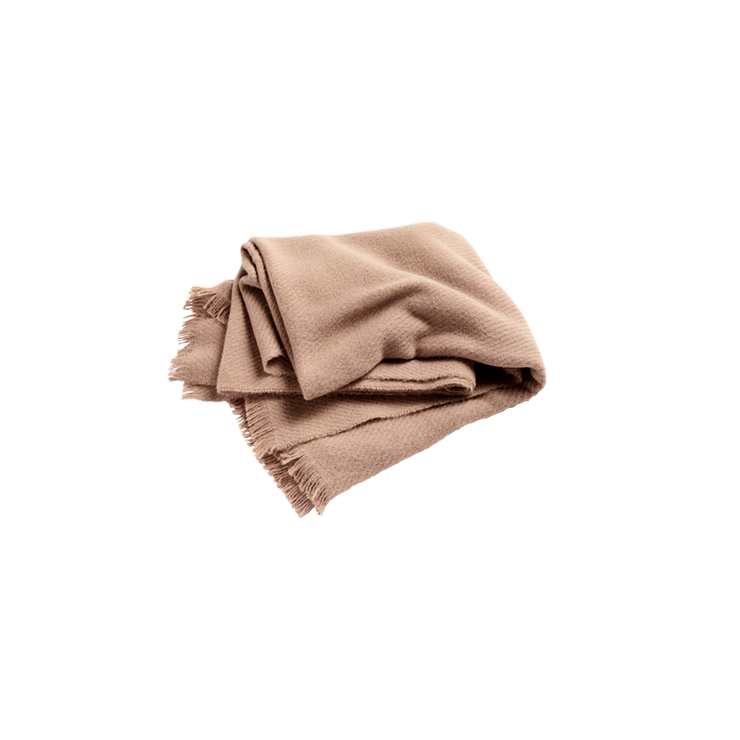 Det myke og deilige pleddet Mono Blanket fra Hay, er laget i 100% ull. Teppet har en twill-struktur med diagonale, vevde linjer.