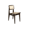 Stolen ble designet i 1947 av den franske designeren Marcel Gascoin, og er regnet som en enkel og funksjonell klassiker med et tydelig formspråk. Denne er i svartlakkert eik.