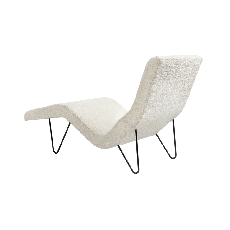 Den strømlinjeformede stolen har et modernistisk design, og en perfekt form for avslapping.