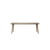 Spisebordet In Between table SK5 fra andTradition, i fargen Smoked Oak.