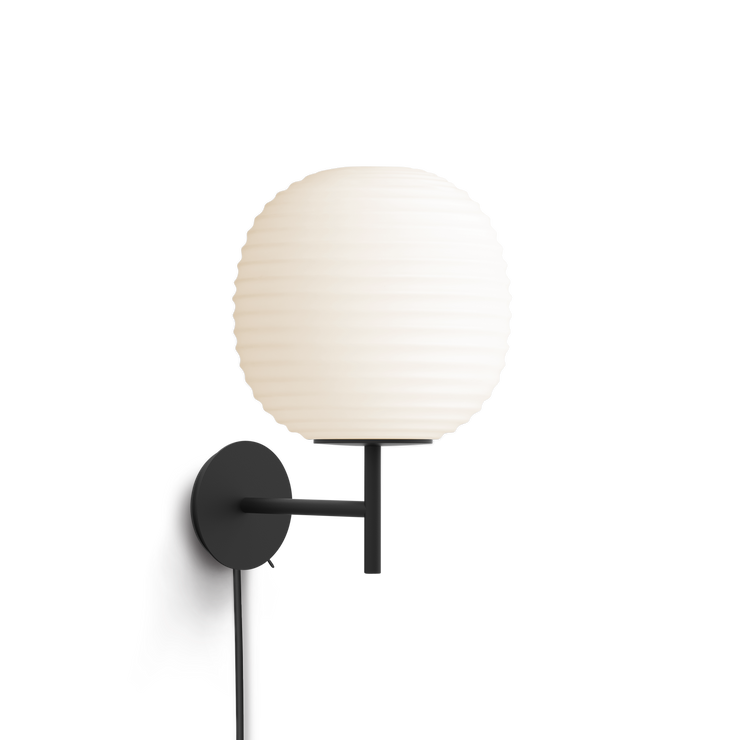 Lysbryteren sitter på selve veggfestet til lampen.