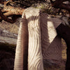 Naturinspirert gulvteppe i ren ull. Mønsteret i Stamme-teppet er inspirert av årringer.