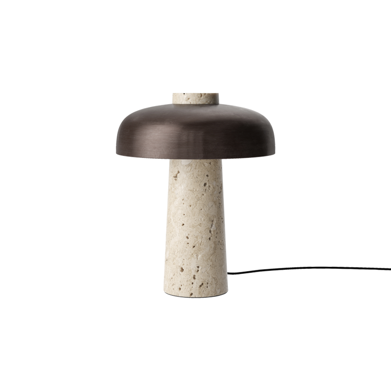 Menu har en egen forkjærlighet for varige naturmaterialer og fiffige funksjoner. Den renskårne bordlampen Reverse i brunert aluminium og beige travertinstein dimmer både temperatur og lysstyrke etter behov!