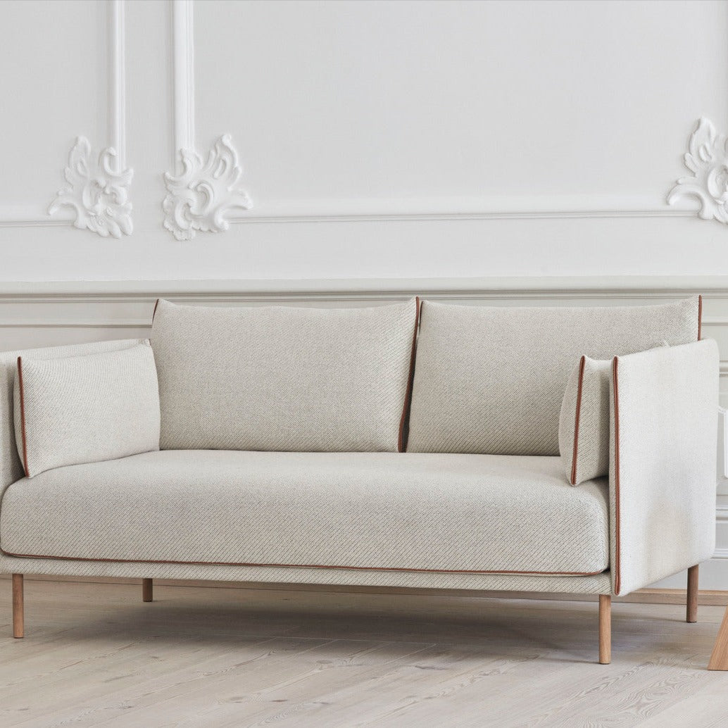 Sofa Silhouette Coda i kremhvitt tekstil fra Hay