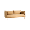 Sofa Silhouette 2-seter i tekstilet Linara 142, sømmer i cognacfarget skinn og eikebein.