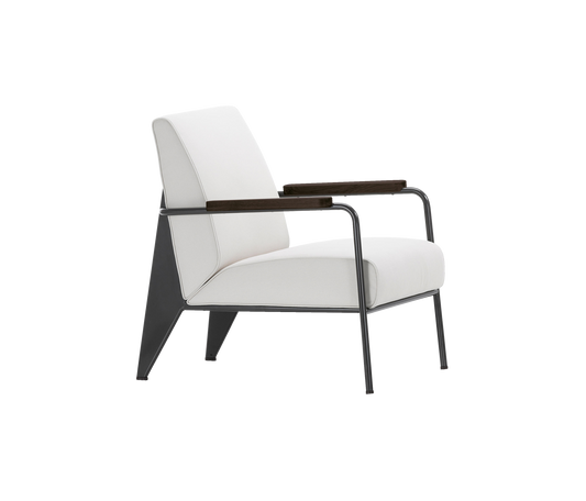 Lenestolen Fauteuil de Salon fra Vitra, ble designet allerede i 1939 av Jean Prouvé. Stolen har delikate og harde linjer. Den har et klart formspråk, som baseres på enkle og estetiske prinsipper.