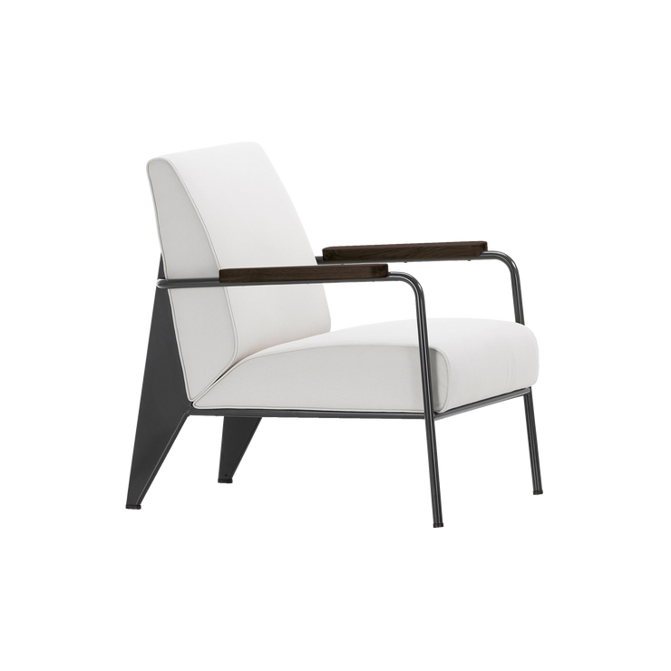 Lenestolen Fauteuil de Salon fra Vitra, ble designet allerede i 1939 av Jean Prouvé. Stolen har delikate og harde linjer. Den har et klart formspråk, som baseres på enkle og estetiske prinsipper.